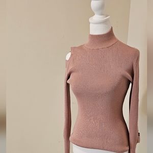 Women's pink long sleeve turtle neck sweater. Size(m)
